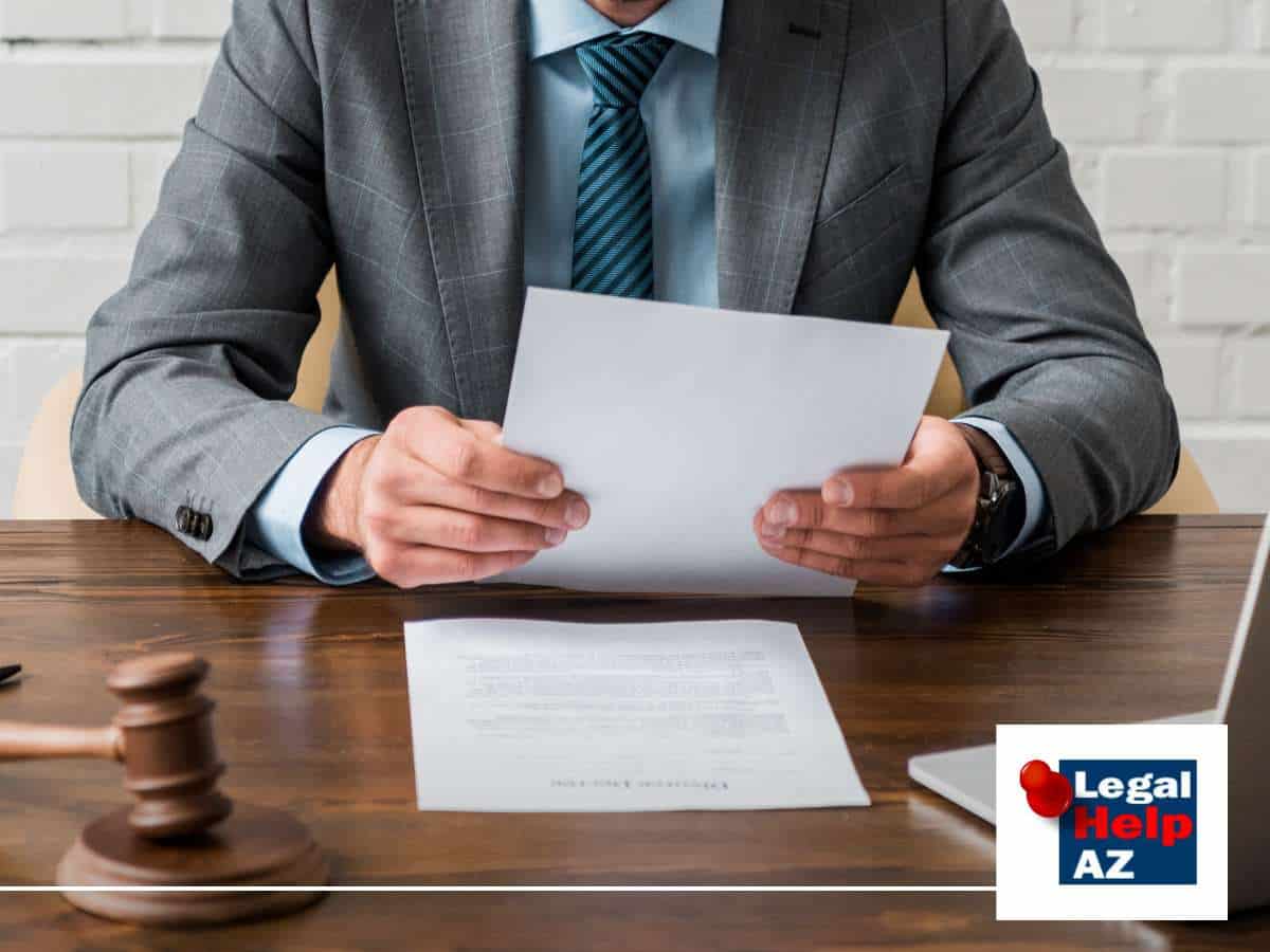 Lawyer reviewing an Arizona Family case at desk